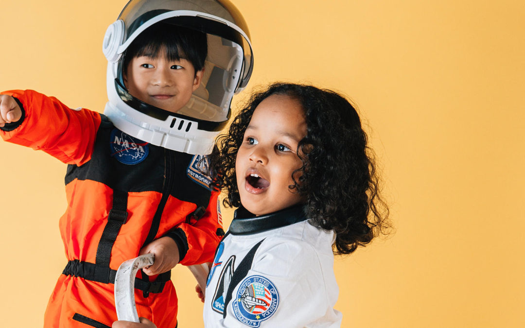 Kids pretending to be astronaughts